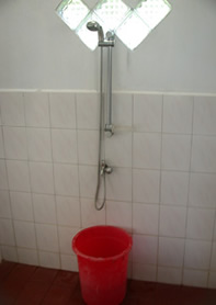 The red basin has a scoop inside